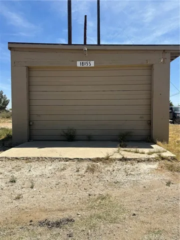 This is on the corner. Parcel is right behind this structure.