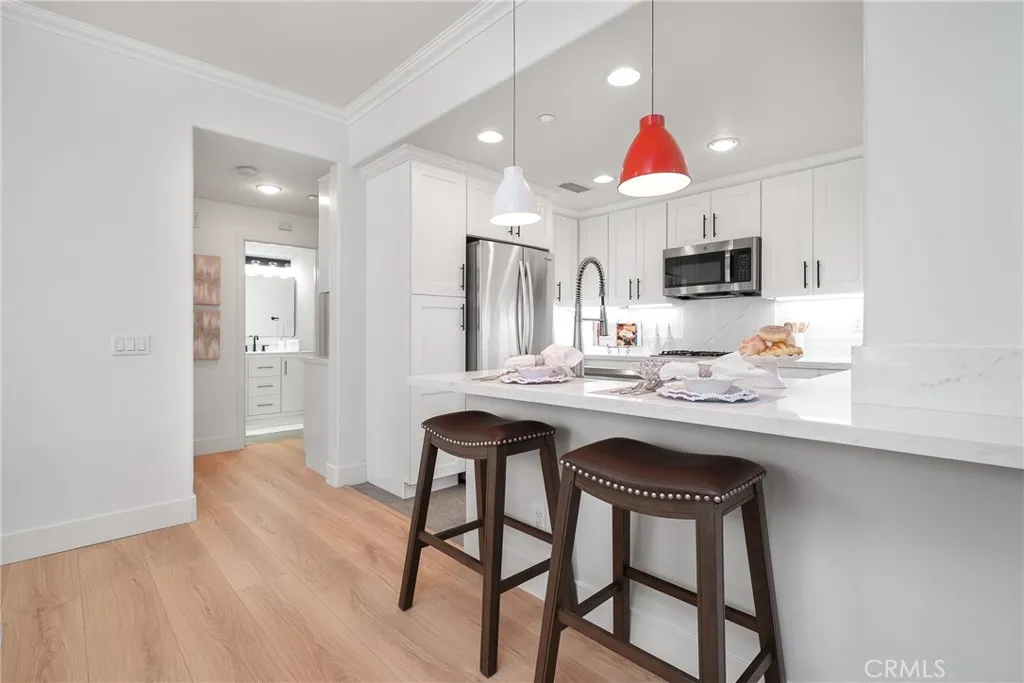 View to the kitchen and the hallway bathroom
