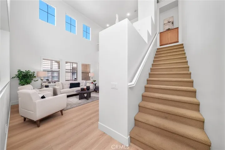 Stairway leading to the primary suite
