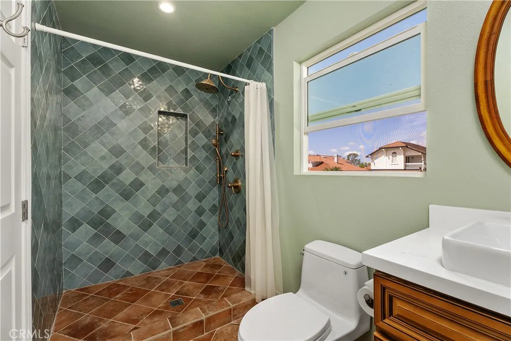 Inlaw suite bathroom with walk-in shower. Permitted addition