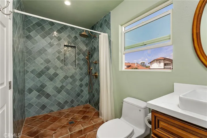 Inlaw suite bathroom with walk-in shower. Permitted addition