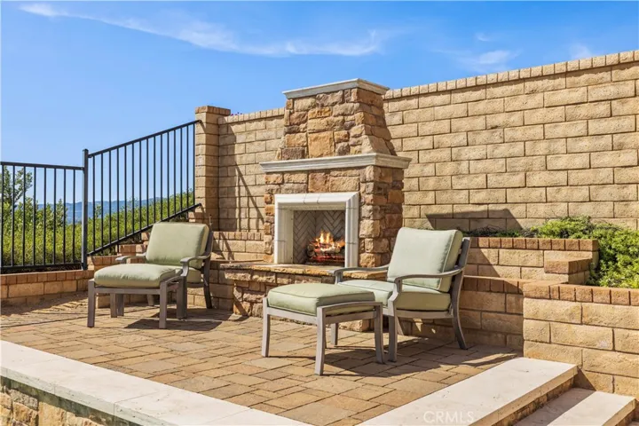 built in fireplace with perfect sunset views