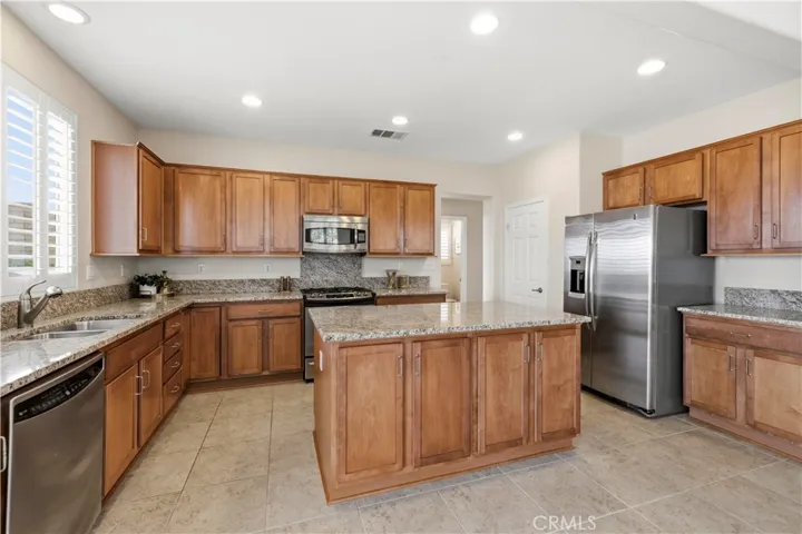 stainless appliances include refrigerator