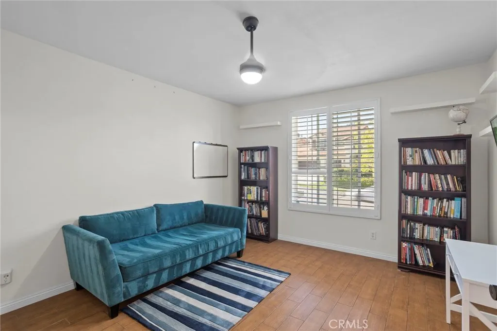 Downstairs room suitable for a bedroom or office, offering a versatile layout