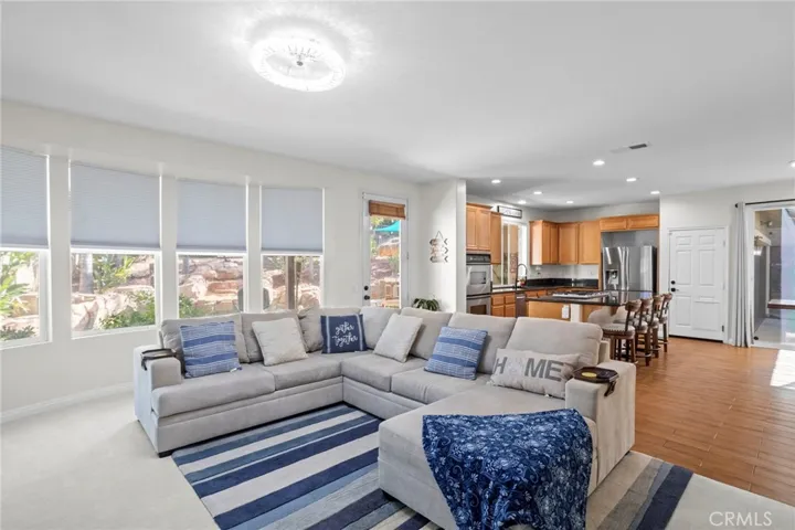 Spacious family room with natural light, and direct outdoor access
