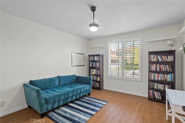 Downstairs room suitable for a bedroom or office, offering a versatile layout