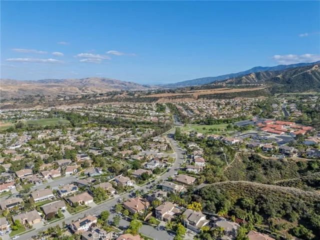 Quiet, well-maintained community with surrounding hills and neighborhood views