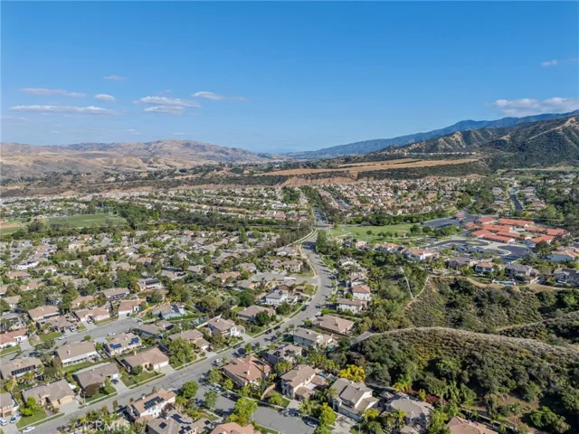 Quiet, well-maintained community with surrounding hills and neighborhood views