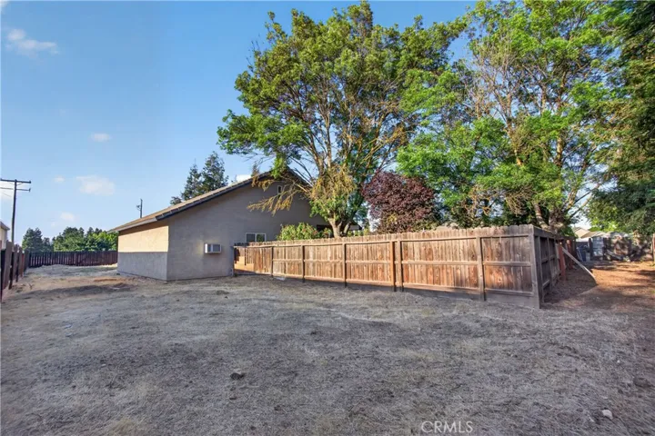Back Area of Pool House, room to drive around backyard and entire property.