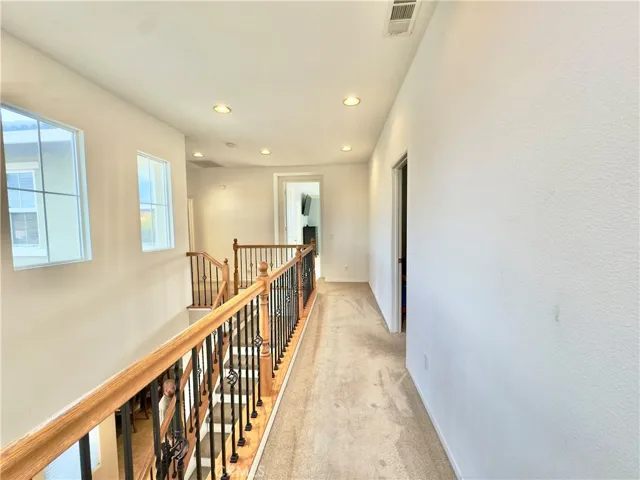 Main upstairs Hallway leasing to Primary Bedroom​​‌​​​​‌​​‌‌​​‌​​​‌‌​​​‌​​‌‌​​‌‌​​‌‌​​​​ Suite