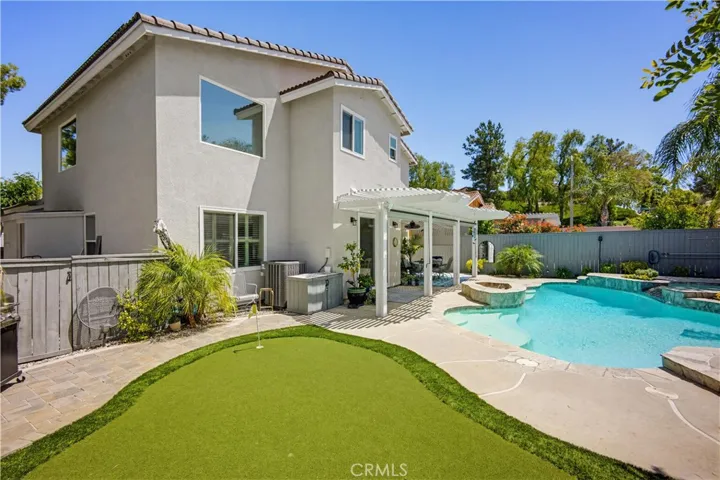 GOLF PUT PLUS POOL AND SPA AND COVERED PATIO