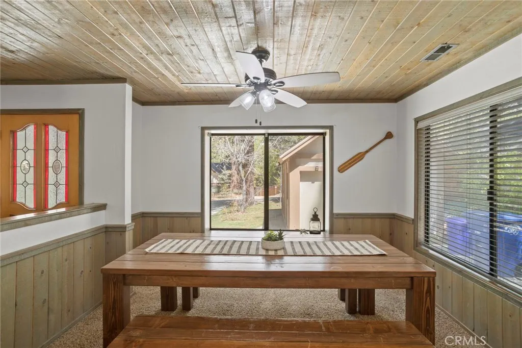 Formal dining room with window seat