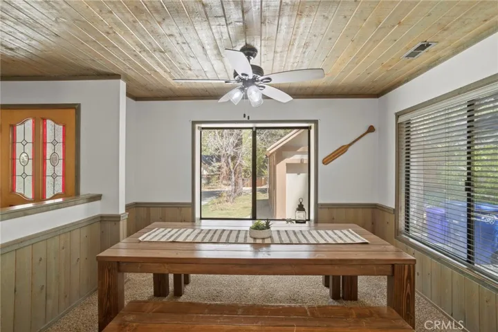Formal dining room with window seat