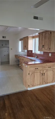 DINING ARE TO KITCHEN VIEW.