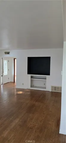 ENTRY WAY AND LIVING ROOM VIEW