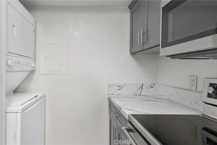 Stackable washer & dryer in kitchen