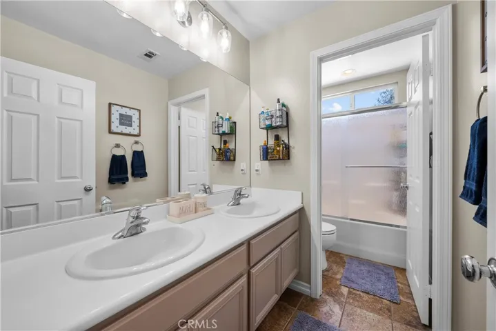 Upstairs Secondary bath with dual sinks and separate shower area