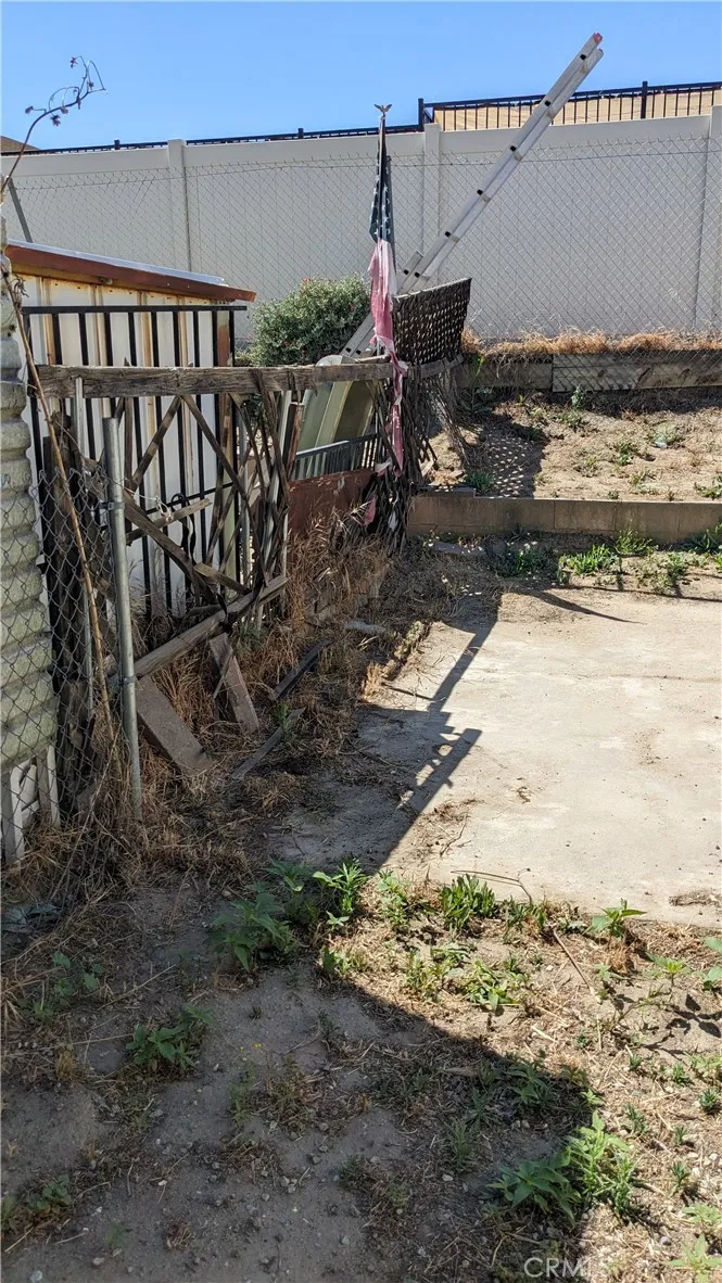 Back fence on Left side needs repair