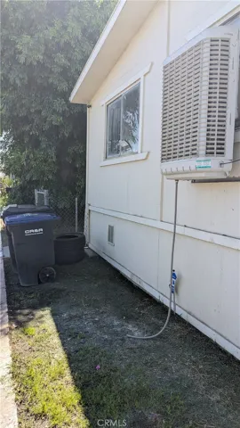 Front left side window pane cracked, has a/c window unit