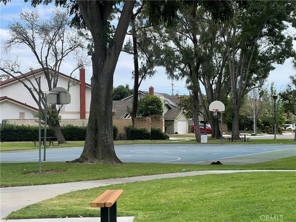 Basketball court good enough to shoot a few hoops with friends and family.