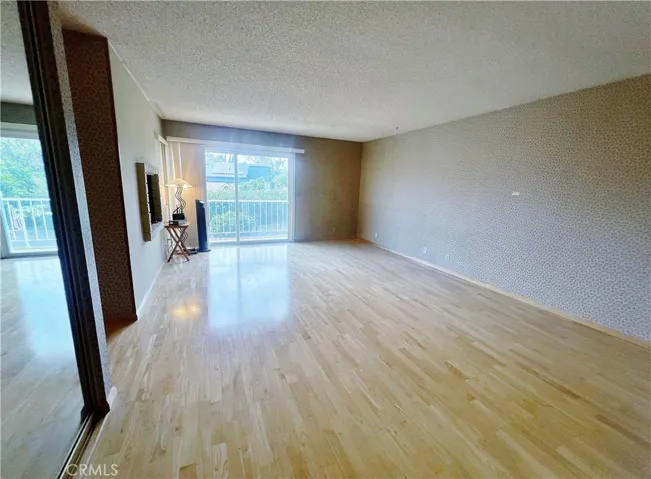 Very Spacious Primary Suite that can fit a King Sized Bed and a Living Room Set or Gym on the side.
