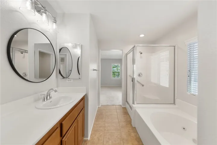 Primary bathroom with separate shower and tub