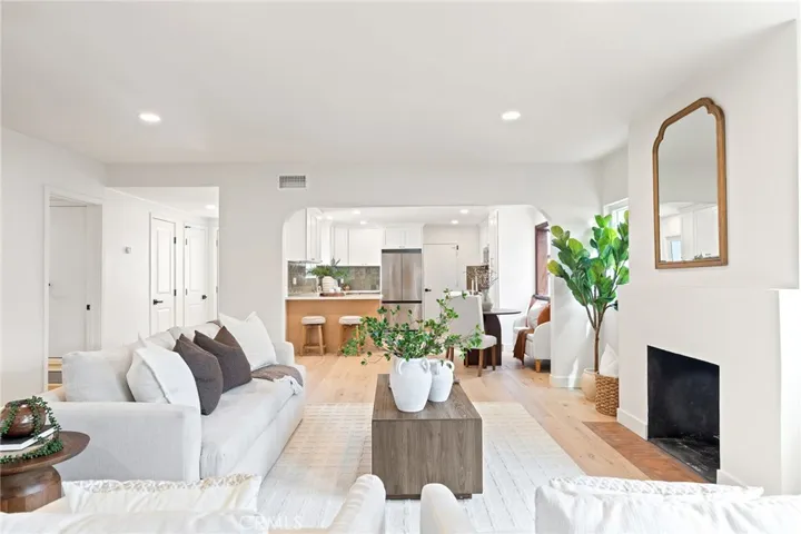 Open Layout Great Room w/ Gas Fireplace and Recessed Lighting.