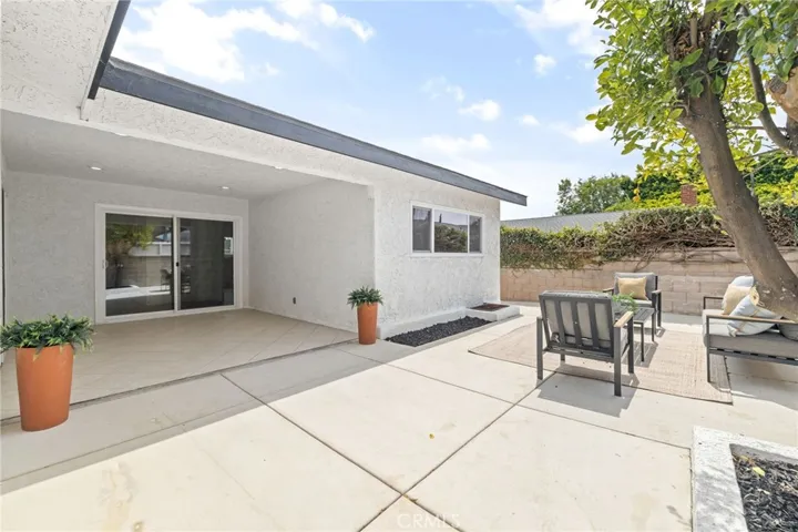 Covered patio and low maintenance backyard