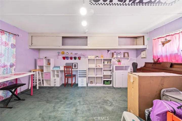Plenty of storage space can be found in the converted garage of 13886 Hazel Drive is ready for your personal touch!