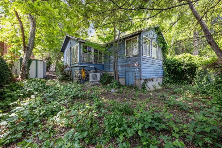 Find serenity in the backyard of 13886 Hazel Drive with the sounds of a babbling brook just next to the back fence!