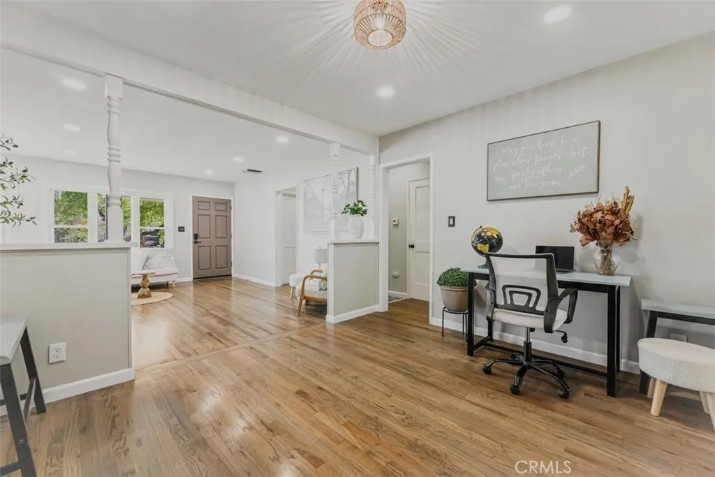 Open Layout of Living Room and Den