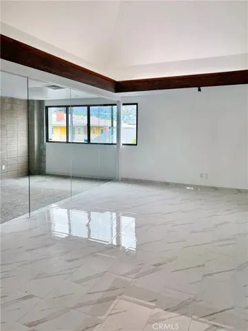 Entry with white marble flooring