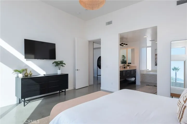 Primary Bedroom with a lot of natural light
