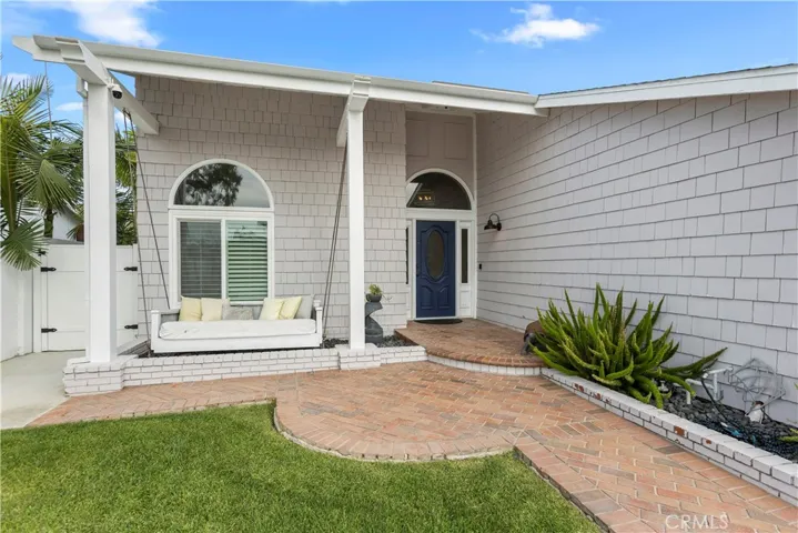 Feel the ocean breeze from your front porch swing!