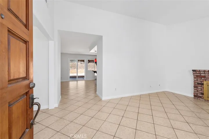 Bright interior living space features fresh finishes and a clean, neutral palette ready for your personal style. The open feel makes the room easy to furnish and enjoy.