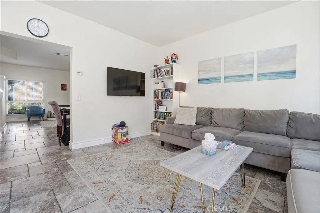 View of the family room into the living room.