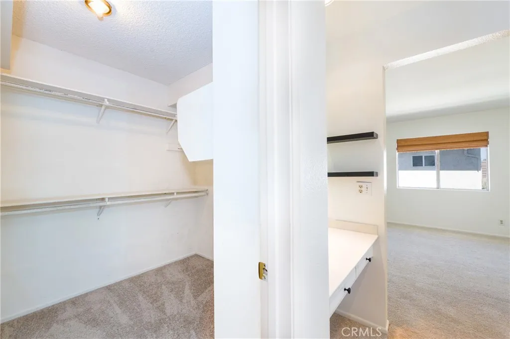 Primary walk in closet & vanity area
