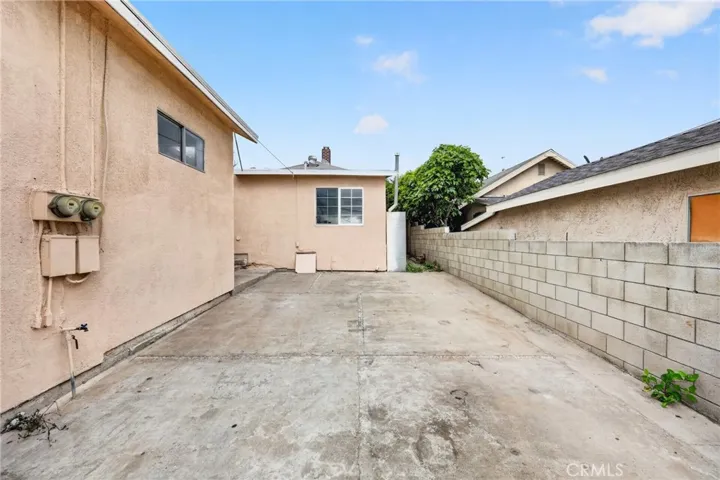Large driveway at rear of property