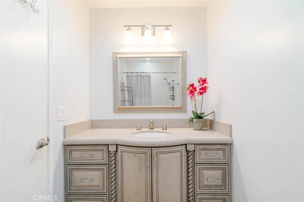 guest bathroom, shower in tub combo.