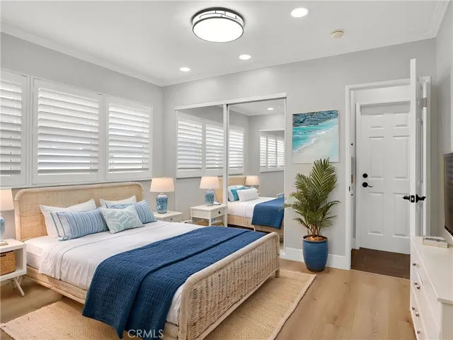 Owners Suite digitally staged with dual mirrored closets
