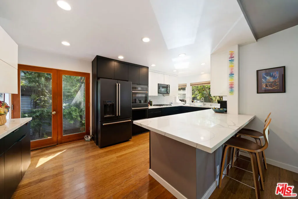 Modern kitchen featuring black