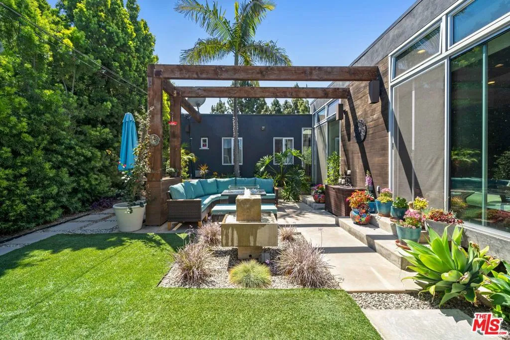 Landscaped backyard featuring