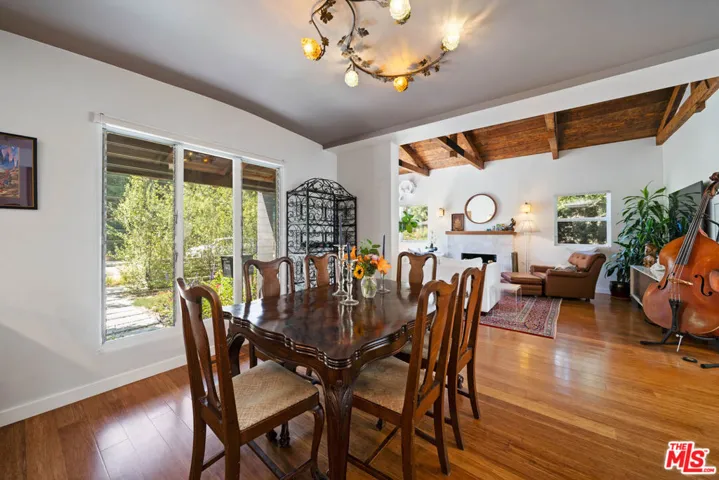 Dining area with hardwood floo