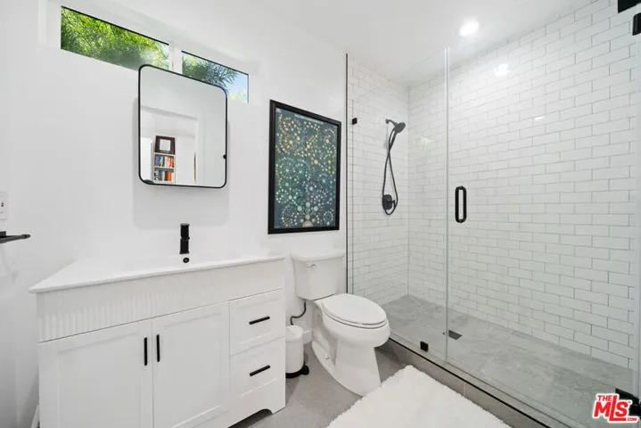 Bathroom with white subway til