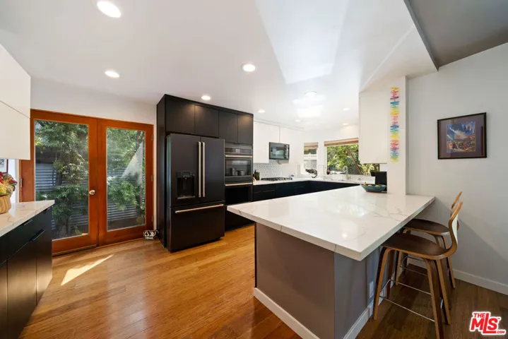 Modern kitchen featuring black
