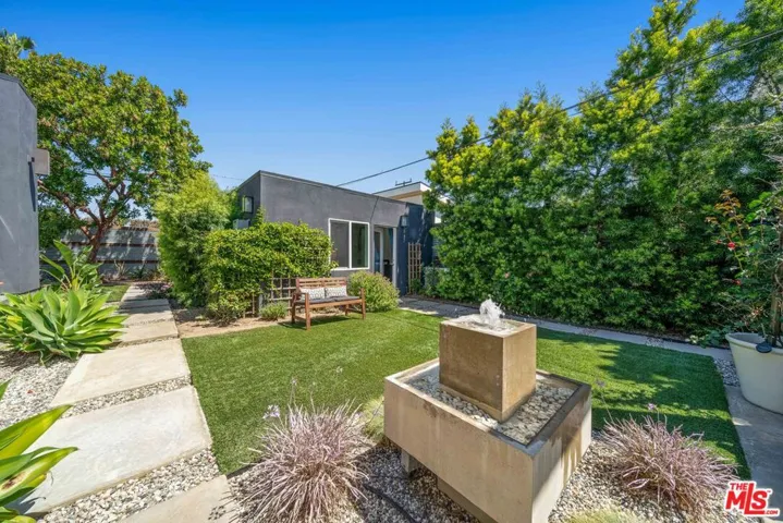 Backyard featuring a concrete