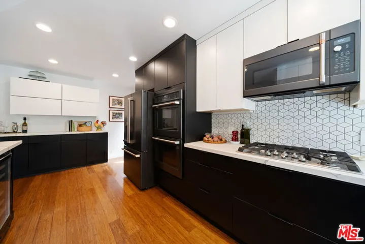 Modern kitchen featuring black