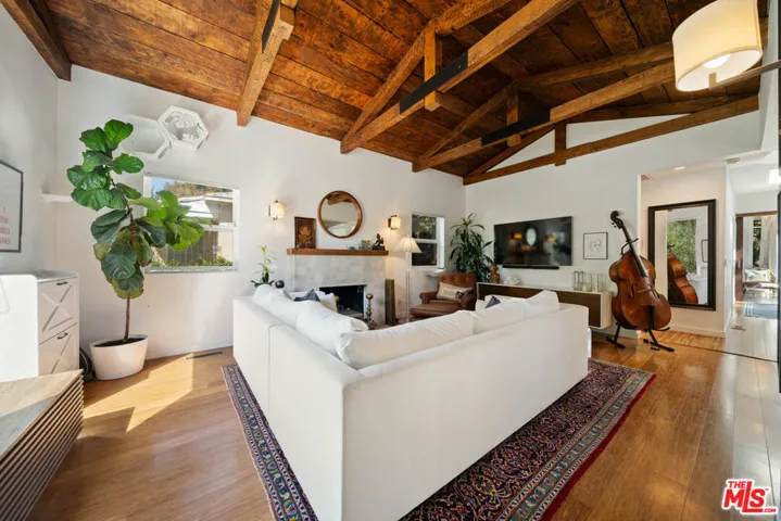 Living room featuring a vaulte