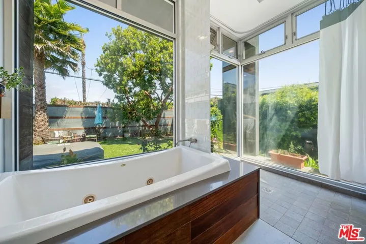 Bathroom featuring a large jet