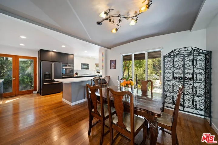 Dining room with hardwood floo